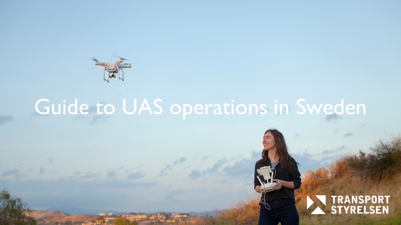 Woman flying a drone on a hill with blue skies in the background